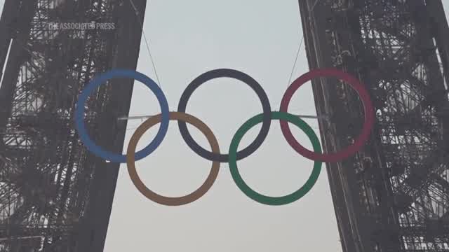 Paris Olympics organizers unveil a display of the five Olympic rings ...